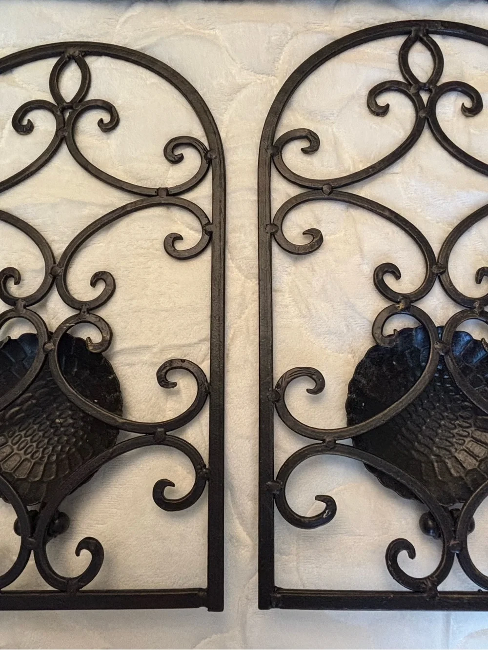 Two vintage iron scroll wall sconce candle holders
